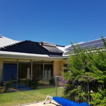 Nedlands, WA. Solar pool heating system installed next to solar power and solar hot water systems.