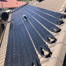 Solar pool heating system installed in Warnbro, WA.